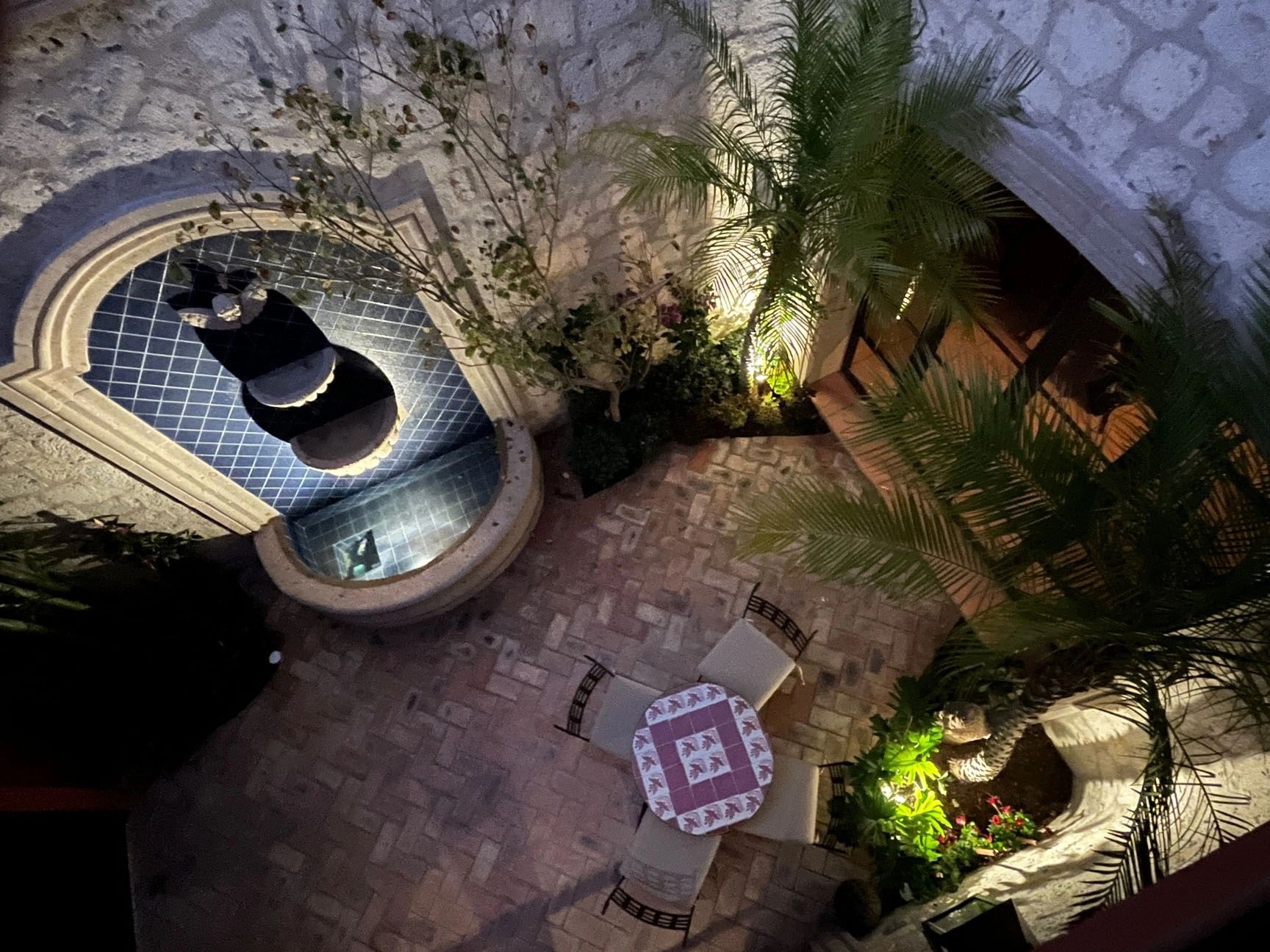 Courtyard at night with ambient lighting